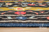 Wool rug styled under coffee table