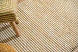 Natural ivory rug edge close-up highlighting stripe pattern
