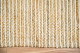 Braided edge detail of natural ivory jute rug