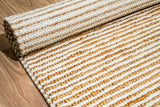 Corner view of natural ivory wool jute rug showing weave pattern