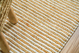 Natural ivory wool jute rug styled in a living room