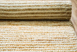 Close-up of pebble weave stripe texture on ivory rug