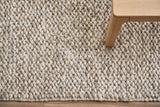 Cashew Loop — close-up of the soft shaggy texture styled in a room