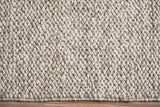 Cashew Loop wool rug — detailed close-up of pile texture and finished edge