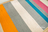 Wool rug pattern detail showing colour variation