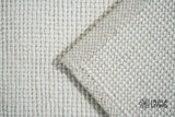 Ivory wool loop weave rug, flat lay view