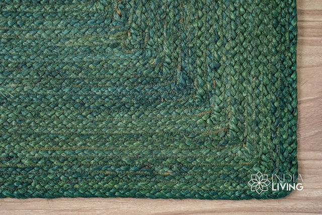 Braided jute rug styled in a living room