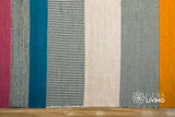 Multicolour striped wool rug styled in a living room