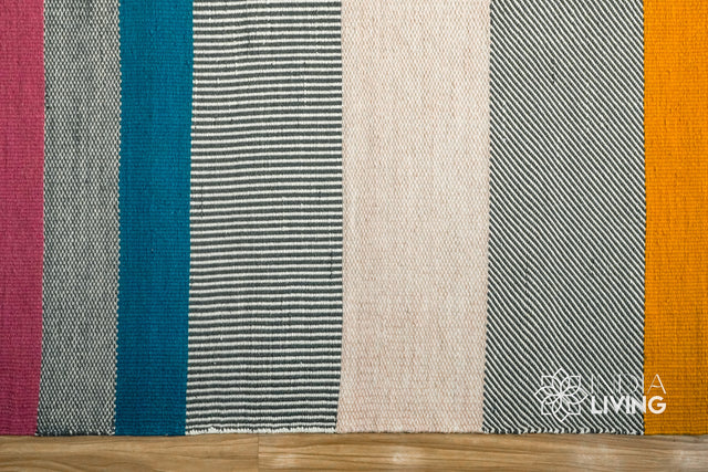 Multicolour striped wool rug styled in a living room