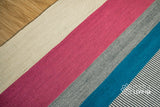 Close-up of striped wool rug weave texture