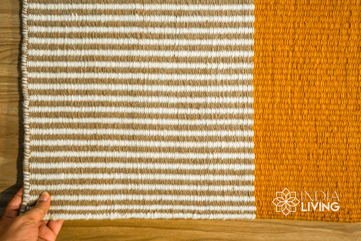 Striped wool rug styled in a hallway runner layout
