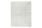 Handwoven ivory wool rug full view on flooring