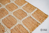 Natural jute rug in a farmhouse decor setting