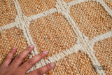 Ivory check rug placed in a dining room