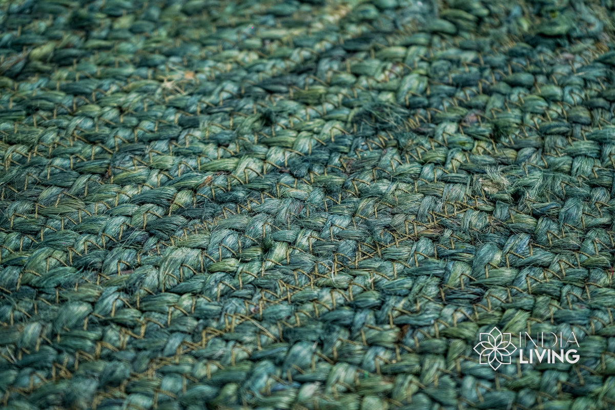 Dyed green jute rug in a boho styled entryway