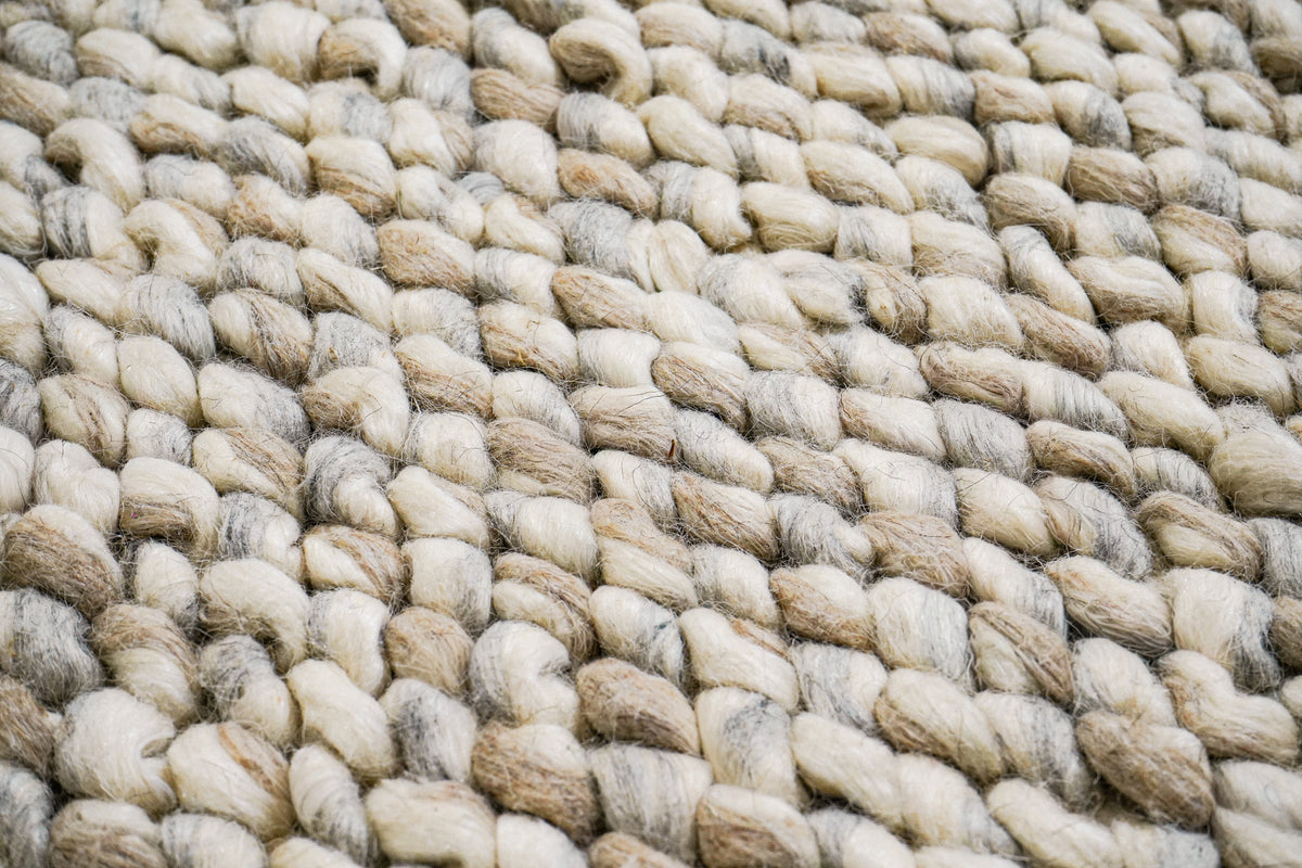 Gray Cashew Loops — wool rug in a macro view showing individual loops and visible surface fibers