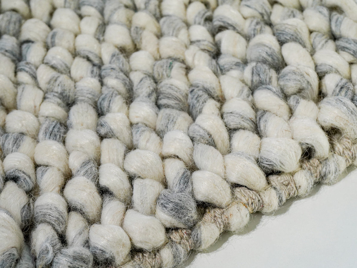 Gray Cashew Loop — close-up of the weave, raised loop pile, and wrapped edge finish