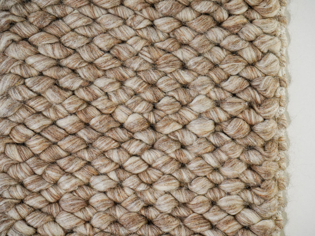 Beige Cashew Loop — Wool rug, close view of the loop pattern along the right edge