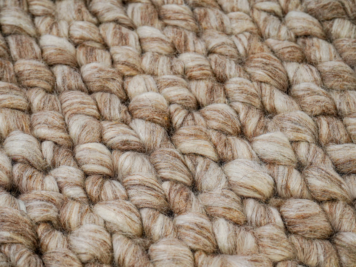 Cashew Loop — close-up of the weave, pile and edge finish, showing rounded beige and tan loops