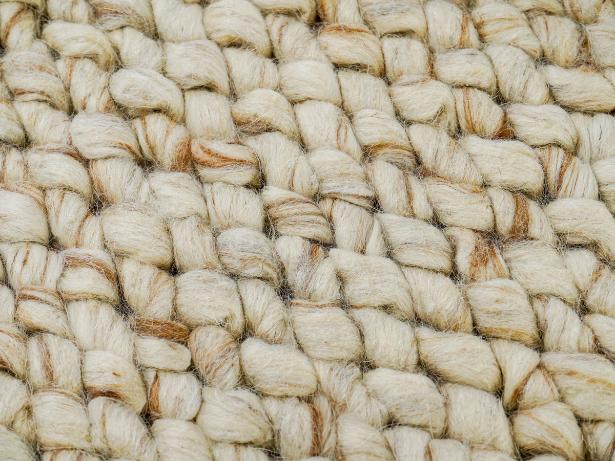 Beige Cashew Loop — Wool rug, overhead macro view of interlocking loops and visible yarn fibers