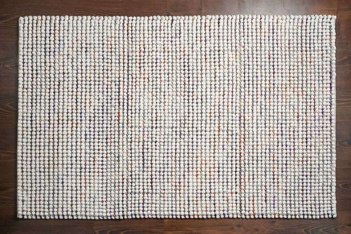 Alter Loops — Purple Wool rug shown in full from above, with narrow colored stripes across a rectangular ivory loop surface