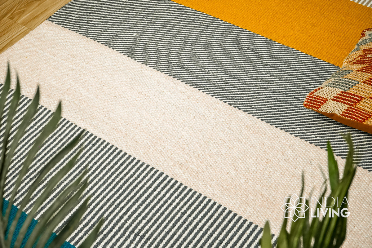 Handwoven striped wool rug full view on flooring
