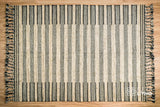 Beige kilim rug styled in a living room