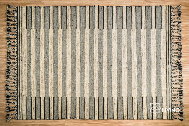 Beige kilim rug styled in a living room