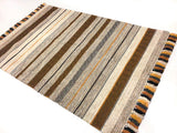 Overhead view of ivory diamond kilim pattern