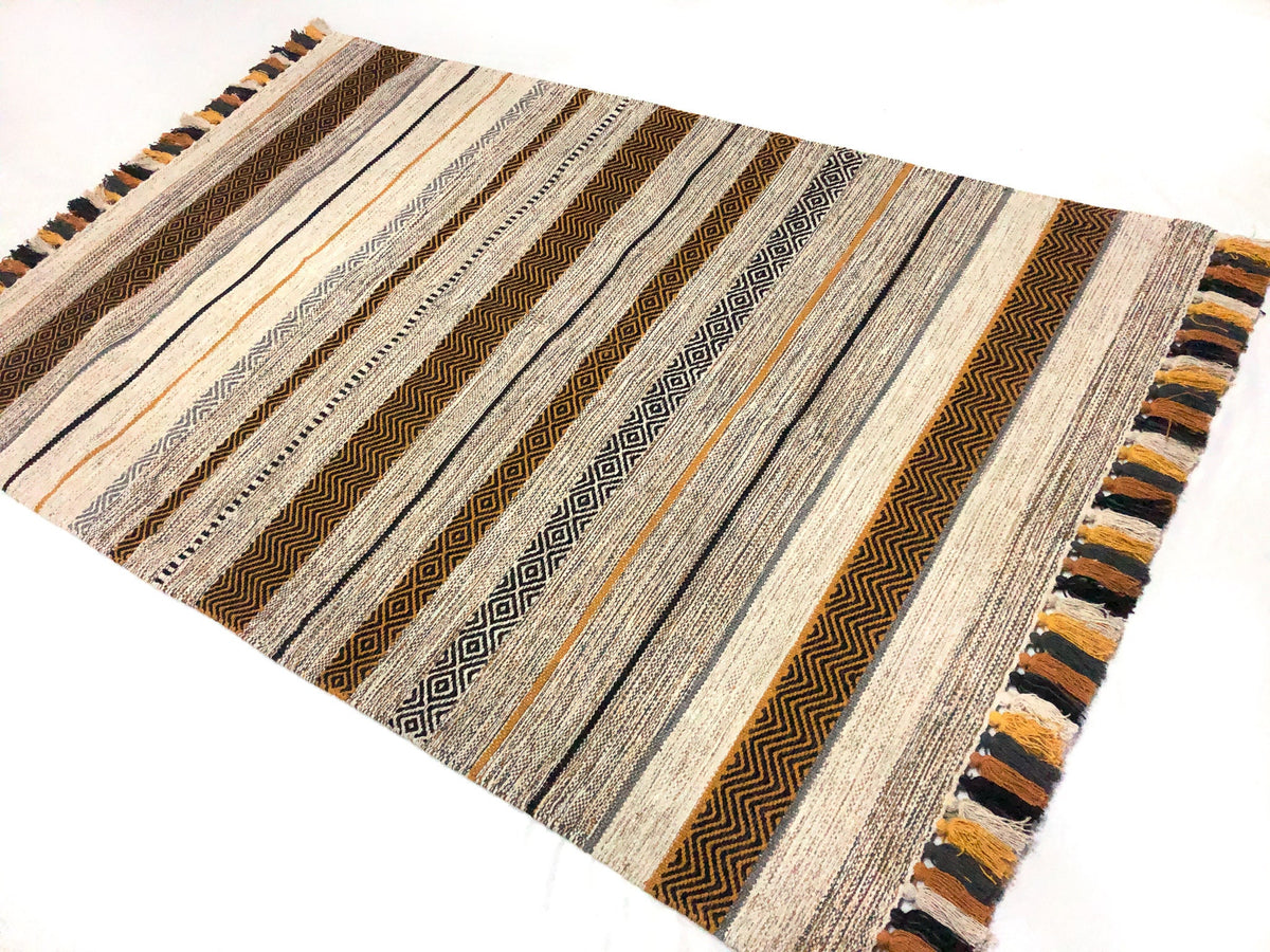 Overhead view of ivory diamond kilim pattern