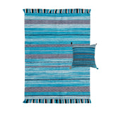 Full view of striped kilim rug on floor