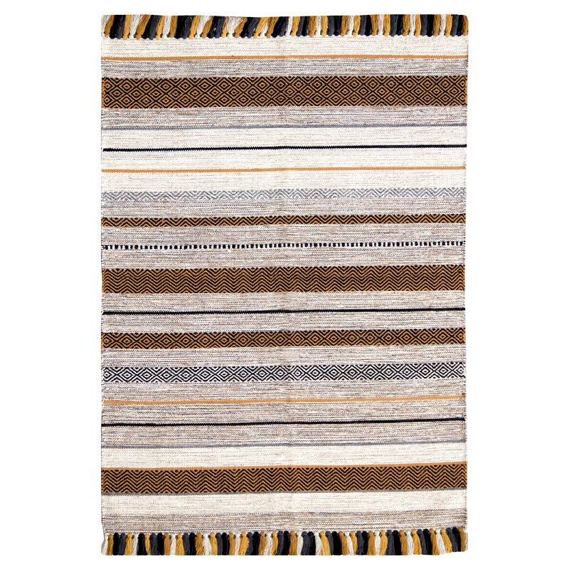 Detail shot of chenille weave texture on ivory rug