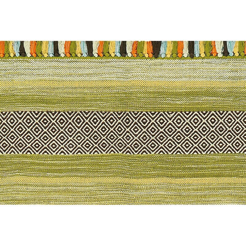 Rug corner detail showing braided tassel