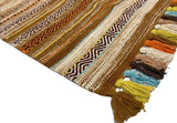 Kilim rug shown in bedroom setting with natural light