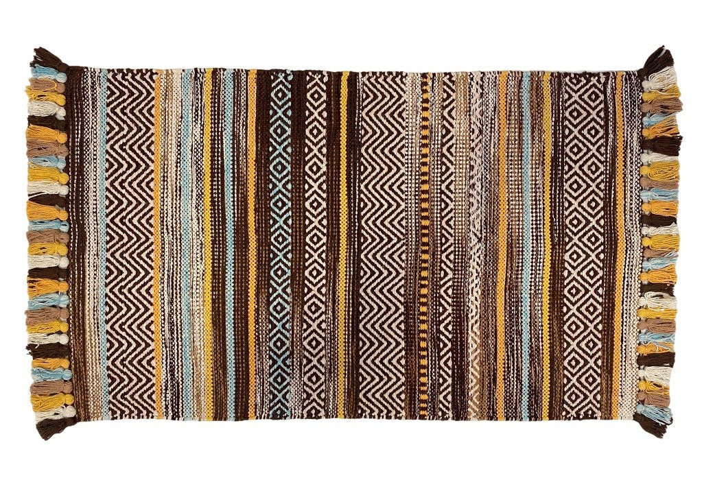 Brown cotton kilim rug flat lay