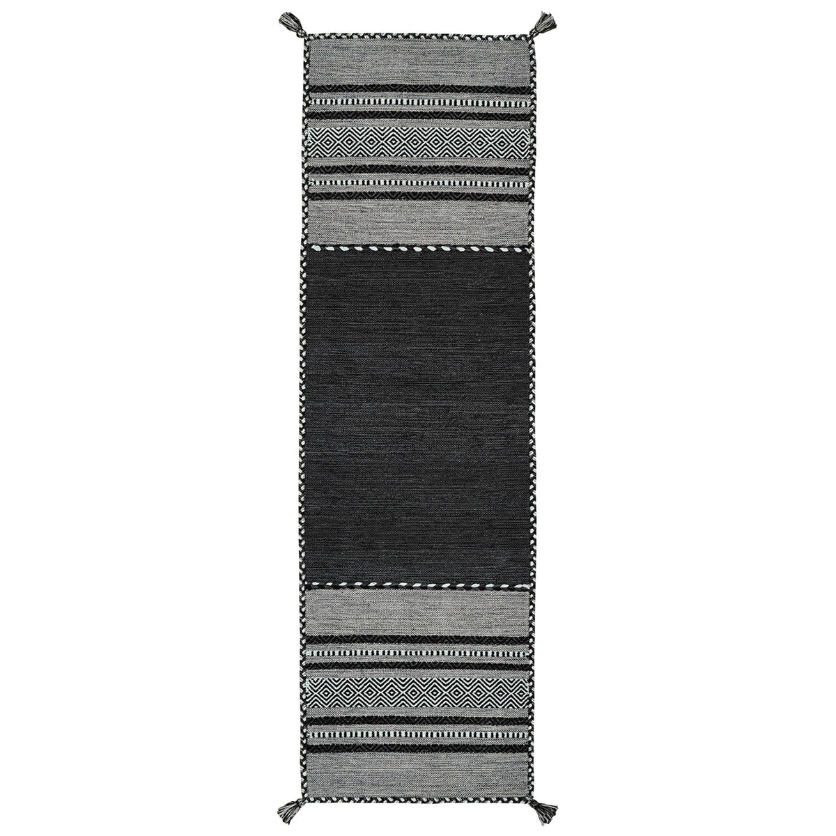 Grey kilim rug styled in dining room