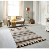 Ivory kilim rug laid flat showing full diamond pattern