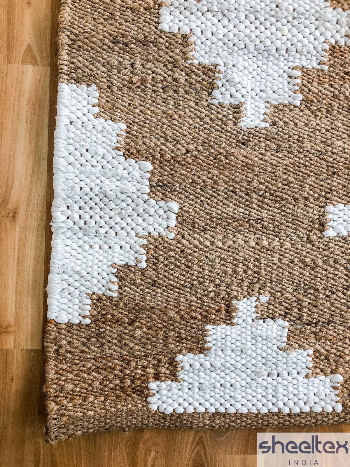 Diamond pattern jute rug corner detail