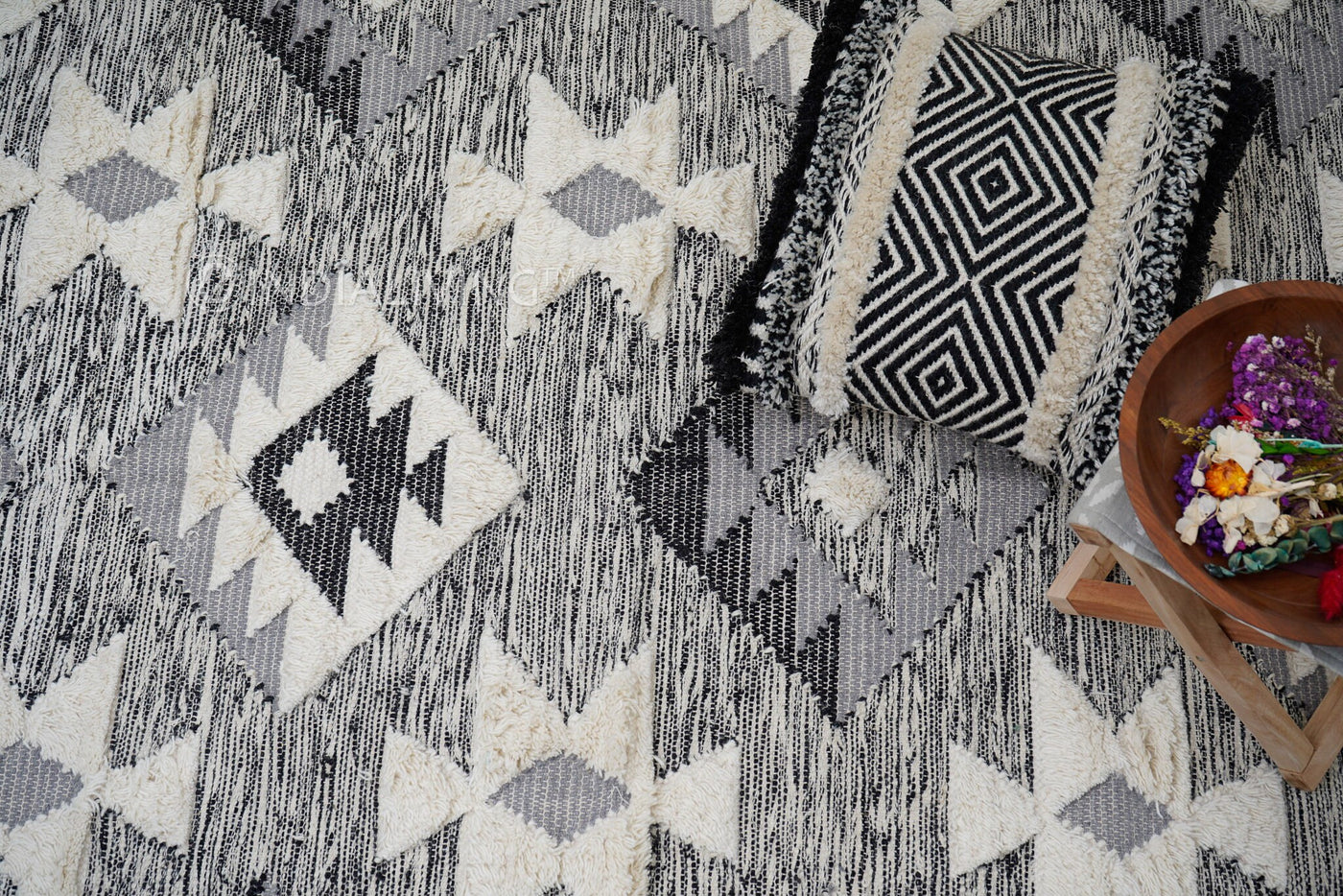 Abstract grey wool area rug flat lay