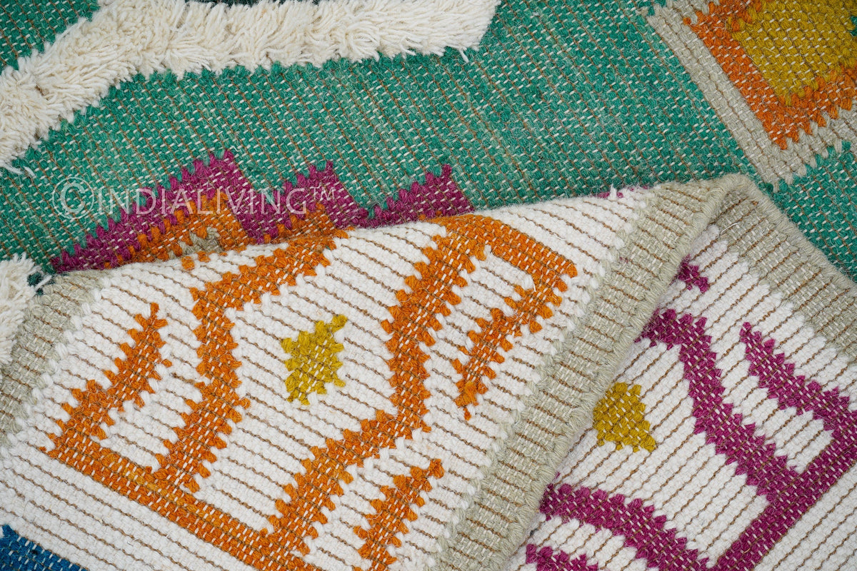 Green kilim rug texture close-up
