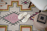 Ivory rug placed on a covered patio