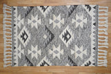 Grey wool rug in a living room setting