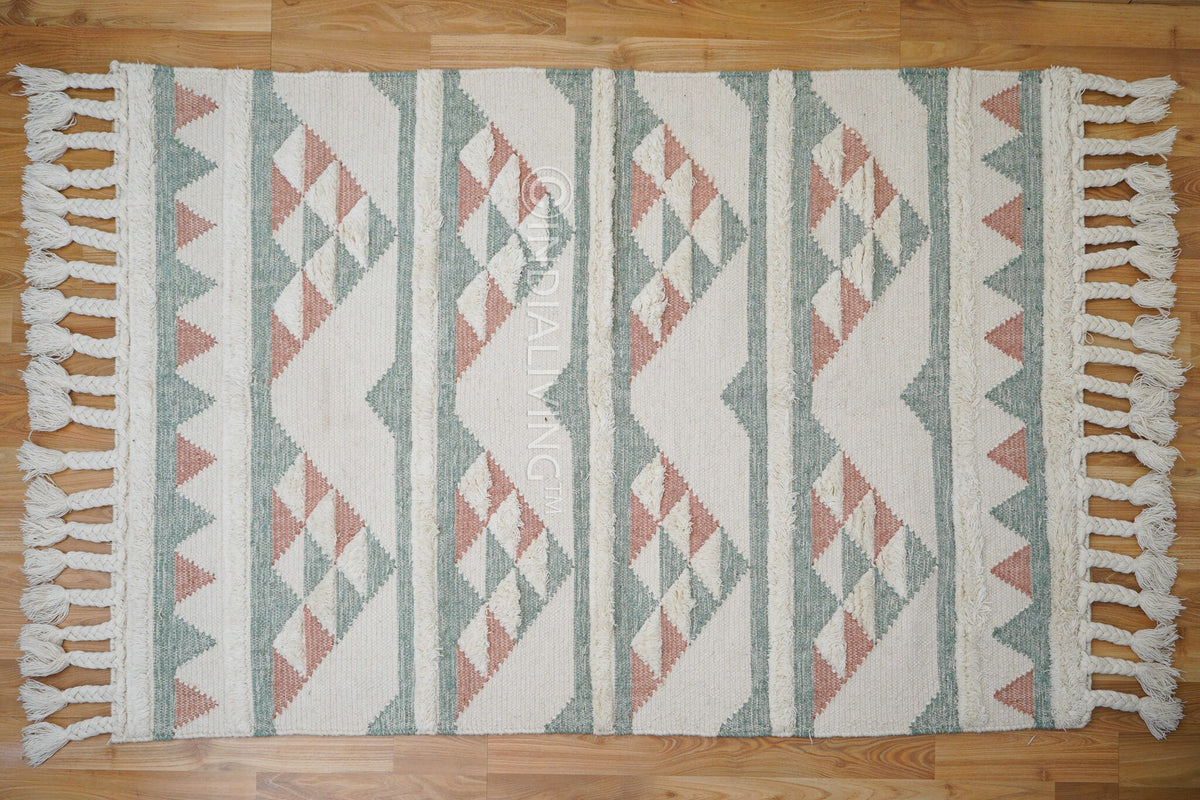 Close-up of handwoven texture on pink blue rug