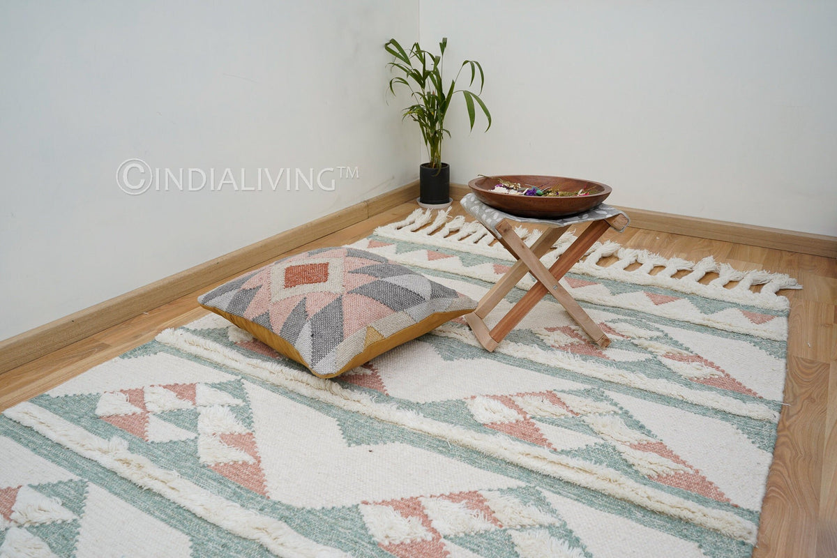 Bohemian pink blue rug styled with abstract patterns