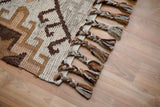 Close-up of handwoven texture on brown beige rug
