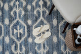 Denim blue rug fringe and braid detail