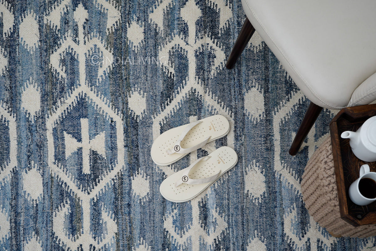 Denim blue rug fringe and braid detail