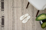 Wide shot of farmhouse rug in a cabin-style room