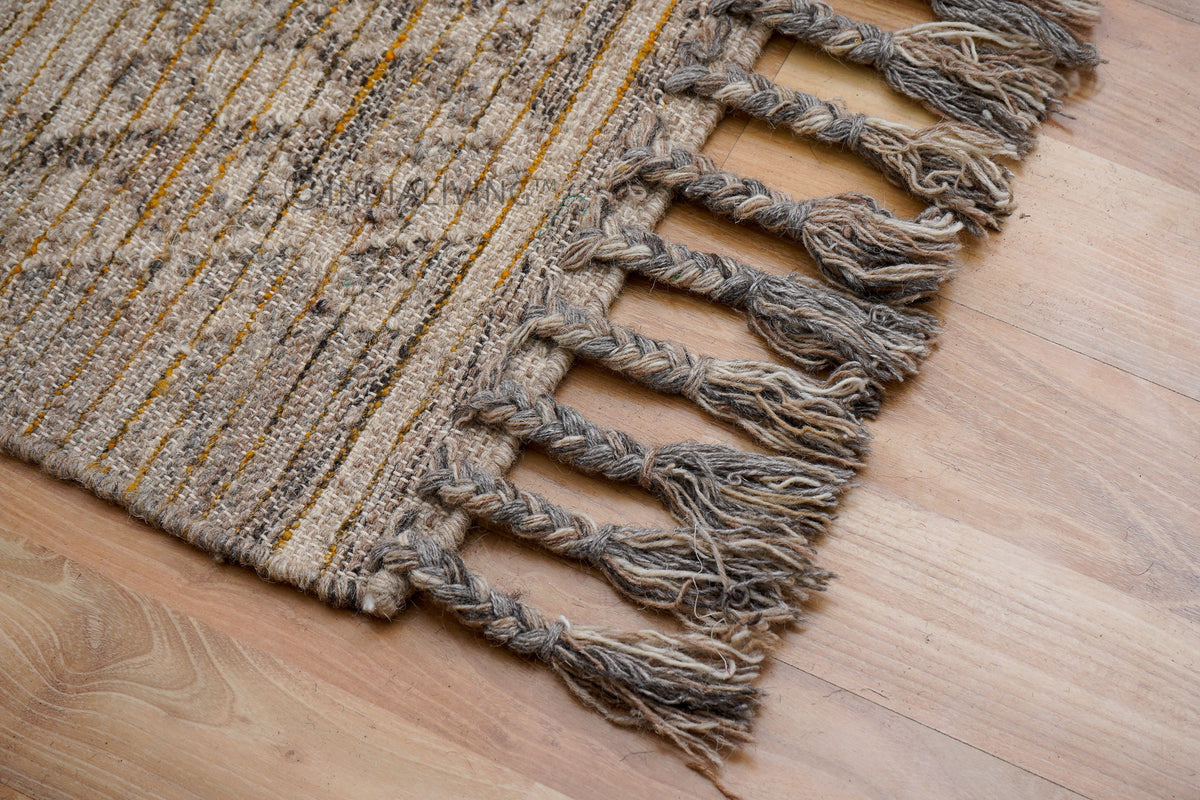 Kilim rug corner detail showing fringe