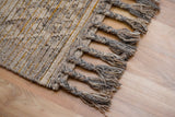 Kilim rug corner detail showing fringe
